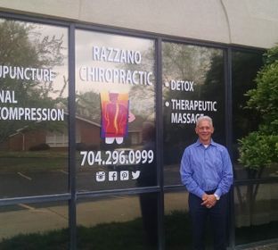 dr razzano in front of building