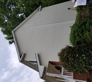 Cleaning rt side of house