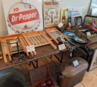 antique washboards and Dr. Pepper signs