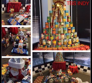 Indiana employees donate canned good for the holidays, and then use them to build fun structures. Items are then donated to local food pantrys.