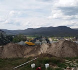 Excavating, Rock Retaining Walls, Utilities, Land Clearing, Demolition, Trucking 